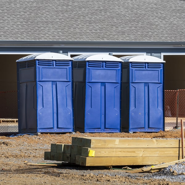 what is the cost difference between standard and deluxe porta potty rentals in Hamilton NC